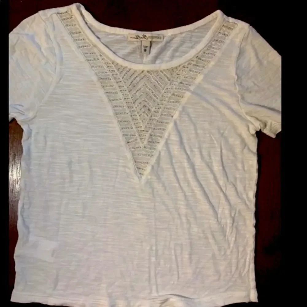 Woman’s express embellished front top